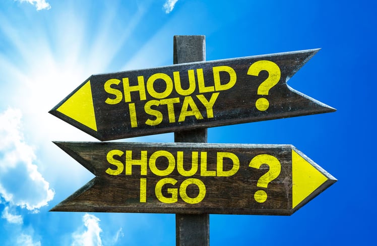 Should-I-Stay-Should-I-Go-signpost-with-sky-background
